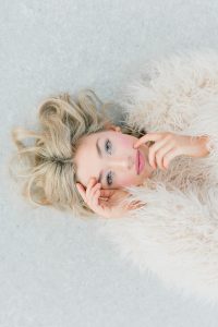 A couple ont their wedding day at the Salt Flats, in Utah Cotton Candy Skies Elopement Styled Shoot over the Bonneville Salt Flats