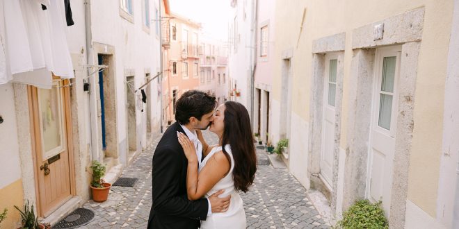 Daniela and Adrian's Sun-Filled Engagement in the Colorful Streets of Portugal