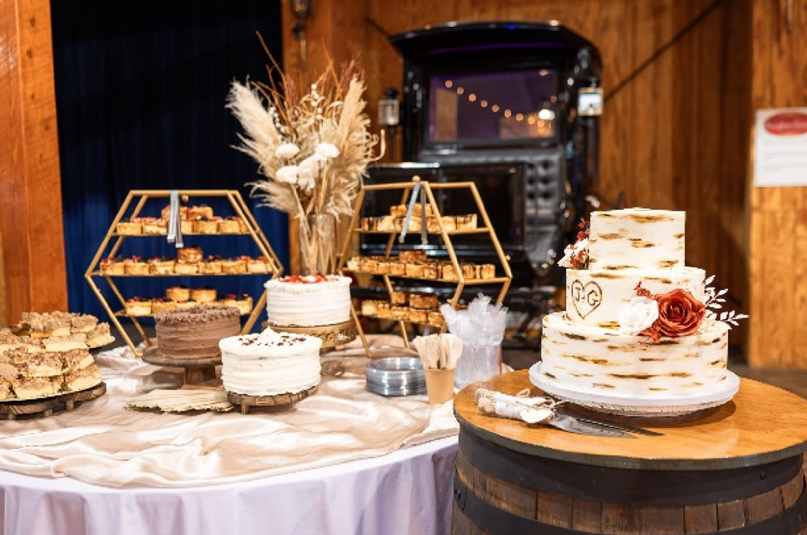 cake table, yellow barn, fall